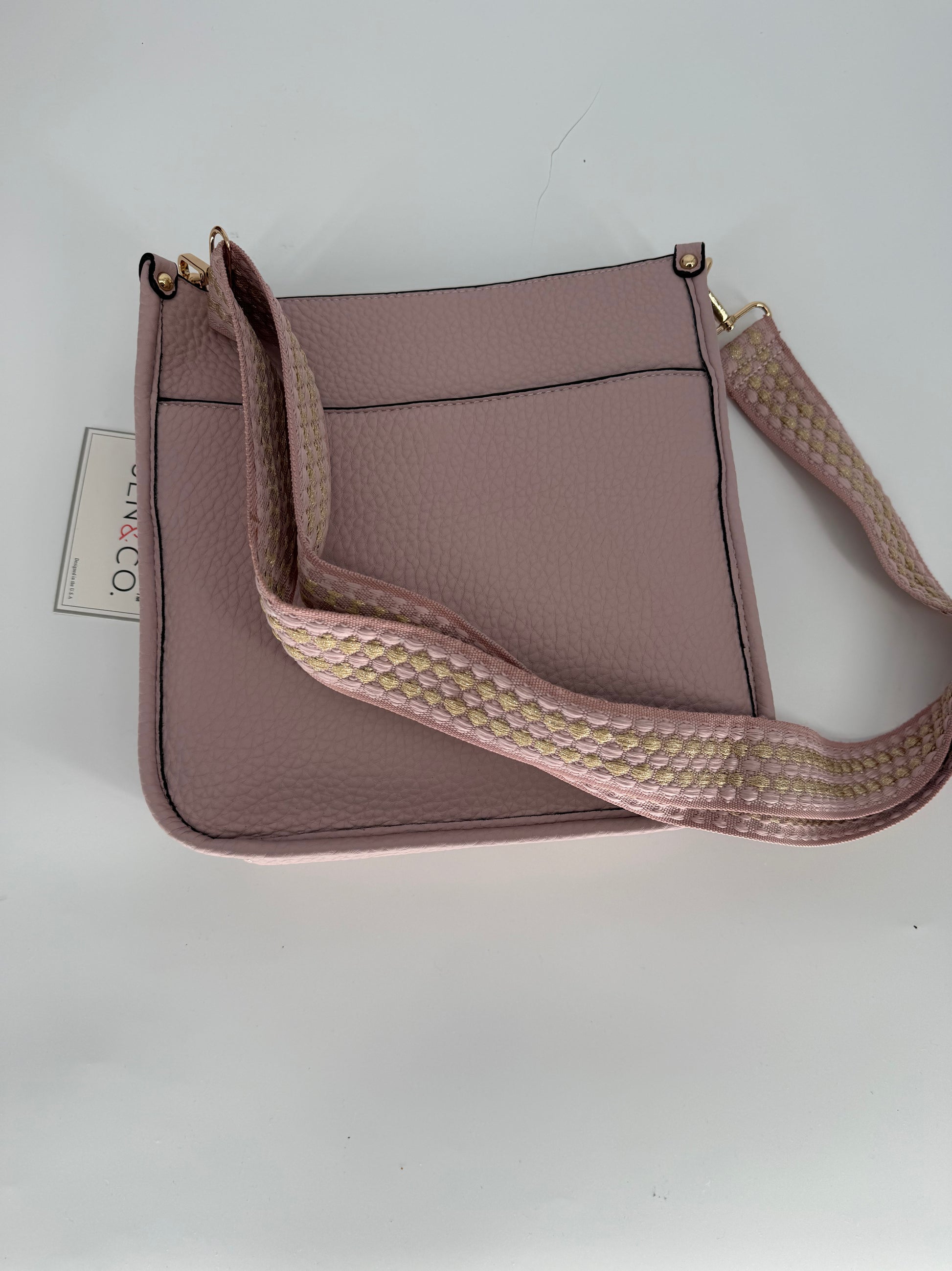 A6 Jen & Co. shoulder and crossbody purse featuring a sleek design in a neutral color, with adjustable strap and minimalist style.