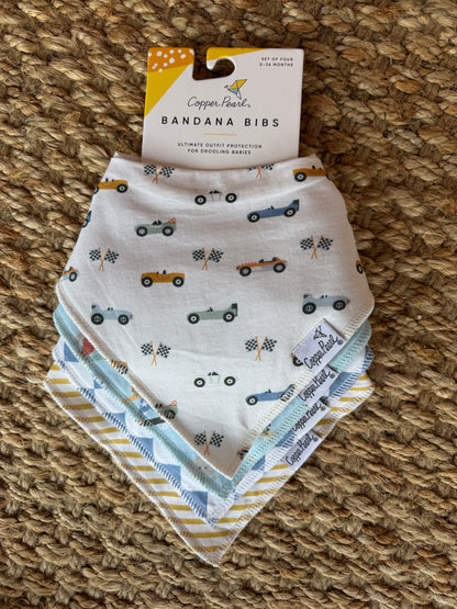 Copper Pearl bandana bibs featuring stylish, absorbent fabric for babies, with a trendy pattern and adjustable snaps.